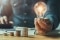 Closeup of a person holding lightbulb